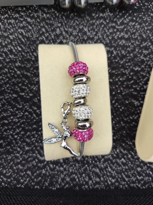 Bracelet de 7 charms perles rose et acier