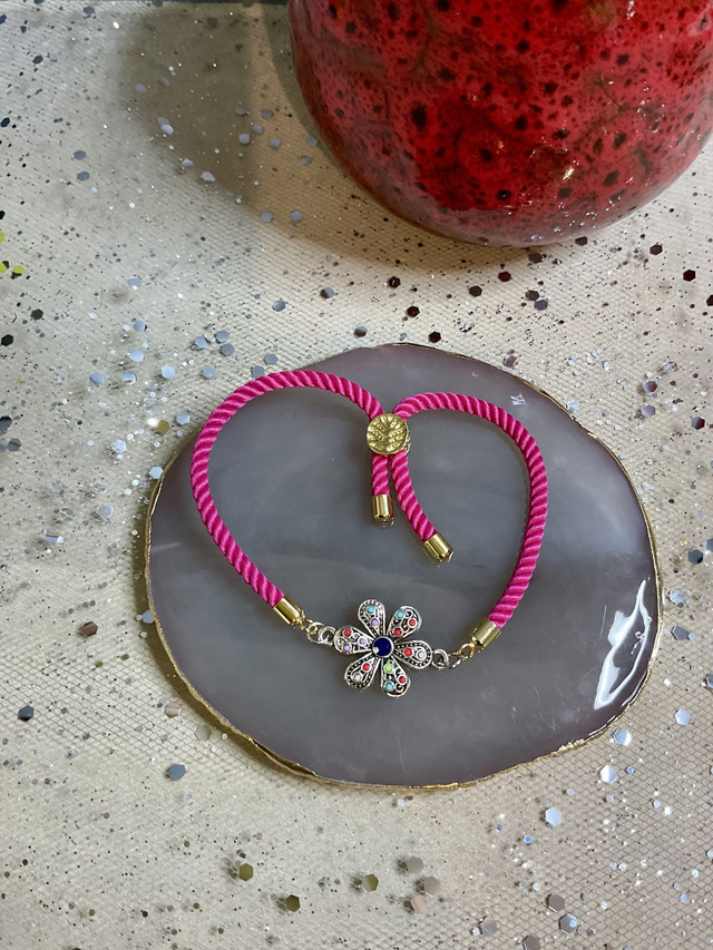 Handmade adjustable cord bracelets.