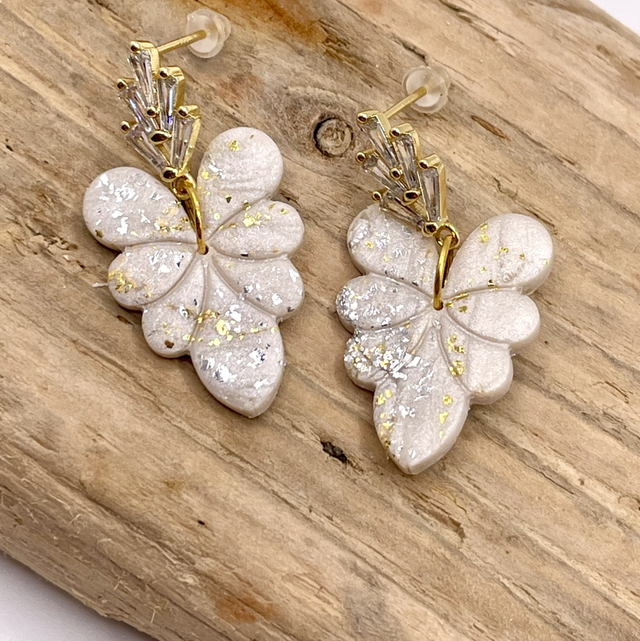 Gold statement leaf earrings