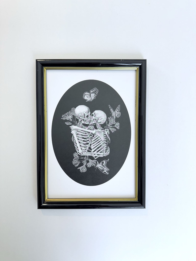 Cadre noir et doré A5