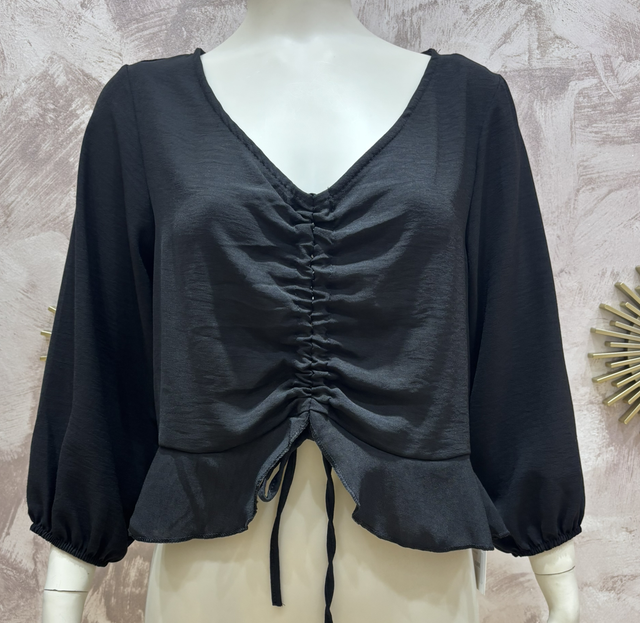 Blusa volantes negra
