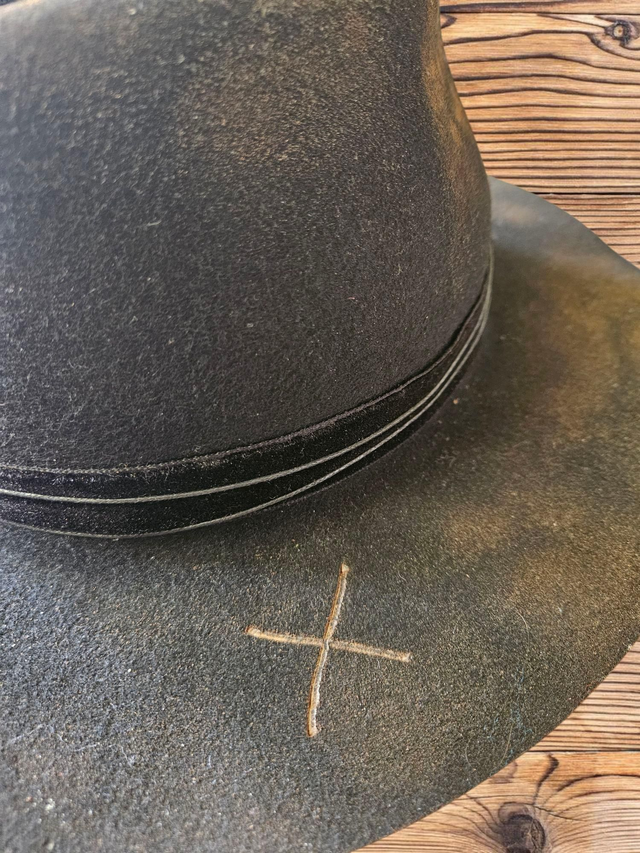Distressed black fedora