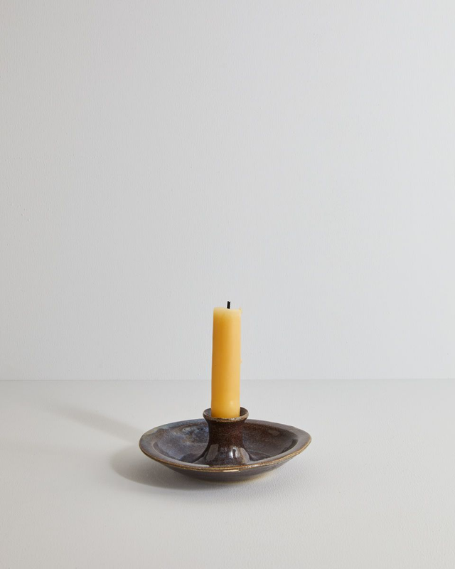 Candle stick holder in blue mist