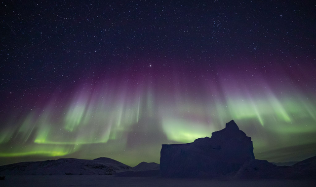Aurora Borealis over Iceberg - Baffin Island, Canada. A5 Premium photographic greeting card. Blank inside for your own message