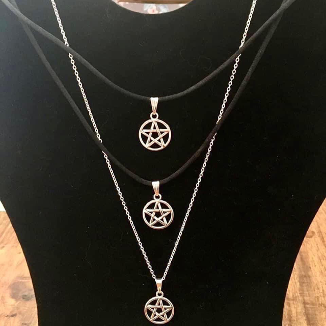 Pentagram necklace on 17”-19” black leatherette cord 