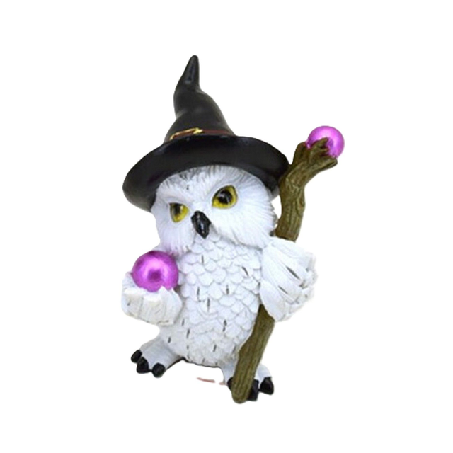 Chouette magique avec bâton de voyage