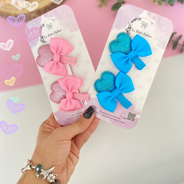 Paire de barrettes à coeur pailletée 
