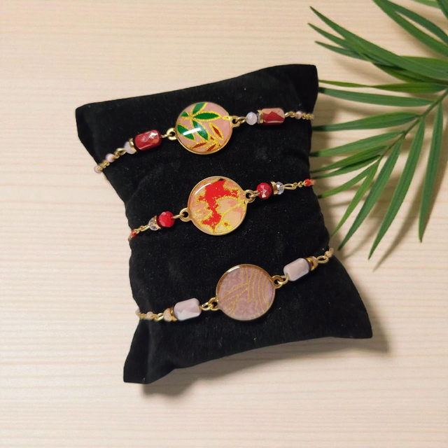 bracelet acier inoxydable motifs japonais rose clair et doré