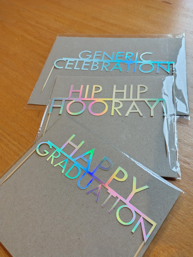 Celebration cake toppers