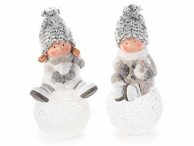 Bambino/a in ceramica su palla di neve c/luce LED e cappello