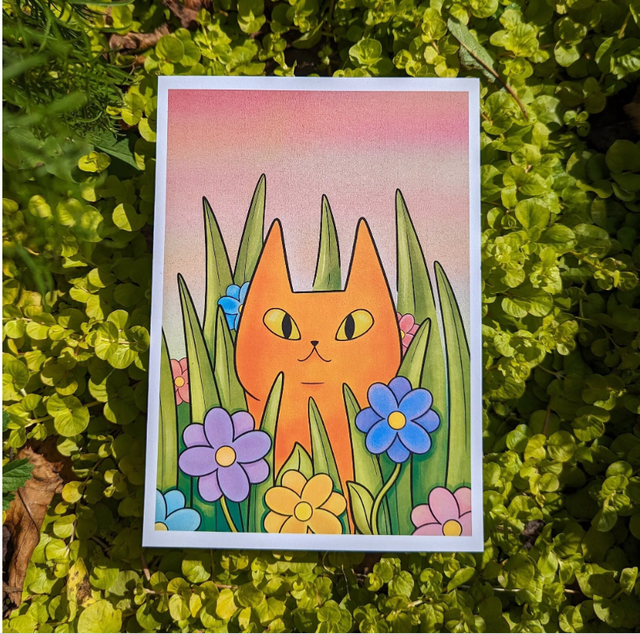 Ginger Cat in Flower Garden