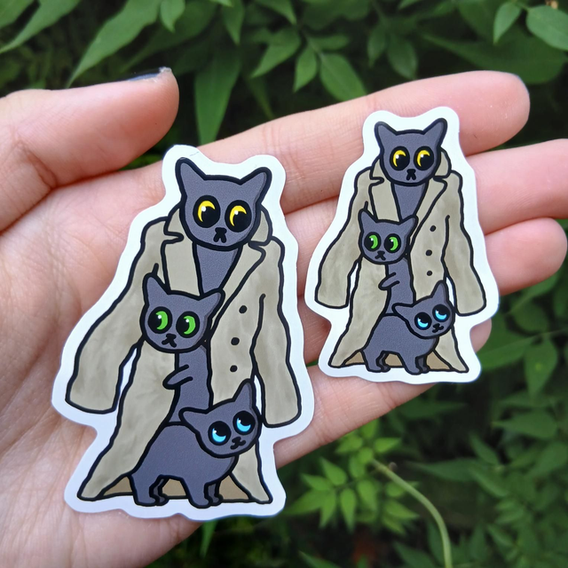 Three Cats In A Trench Coat Sticker