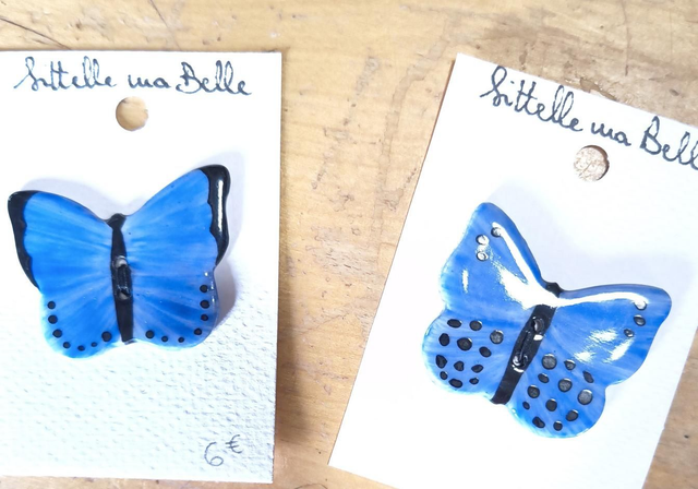 Bouton papillon bleu 