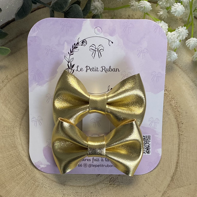 Paire de petites barrettes métalliques dorées 