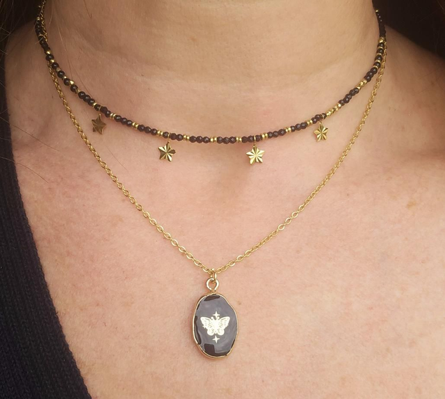 Collier double rangs papillon 