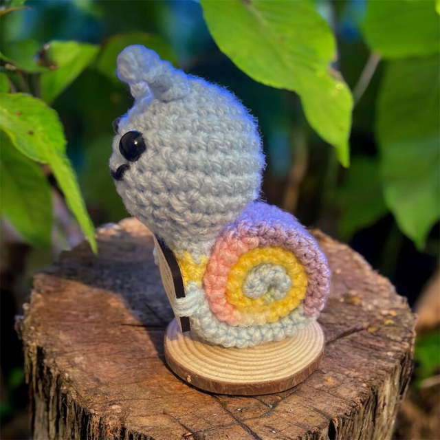 Crocheted positive pal (snail)