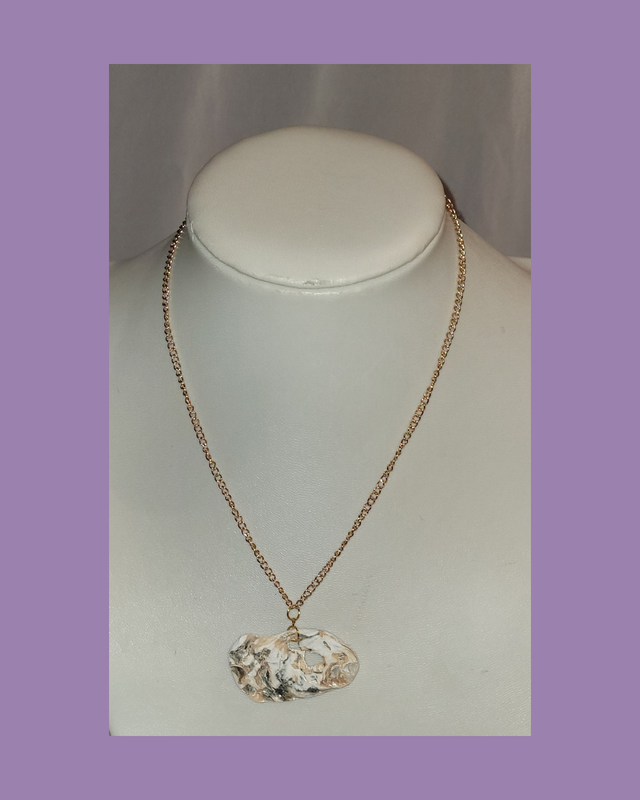 Gold chained shell necklace