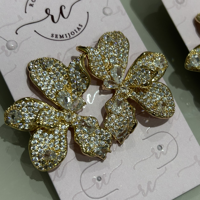 Brinco flowers cristal - banho flash Disp. Prateado e dourado