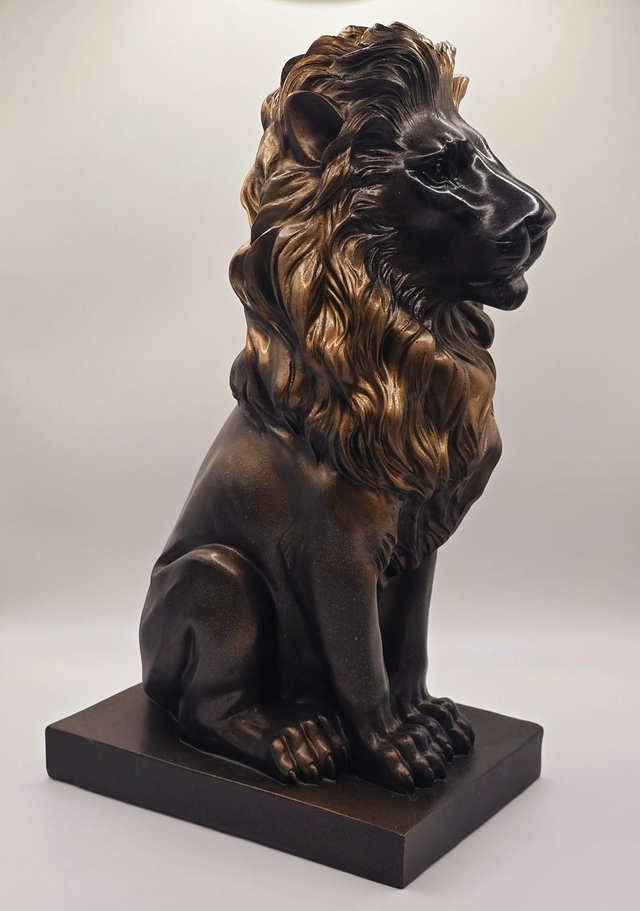136. Black and Gold Lion Sculpture 