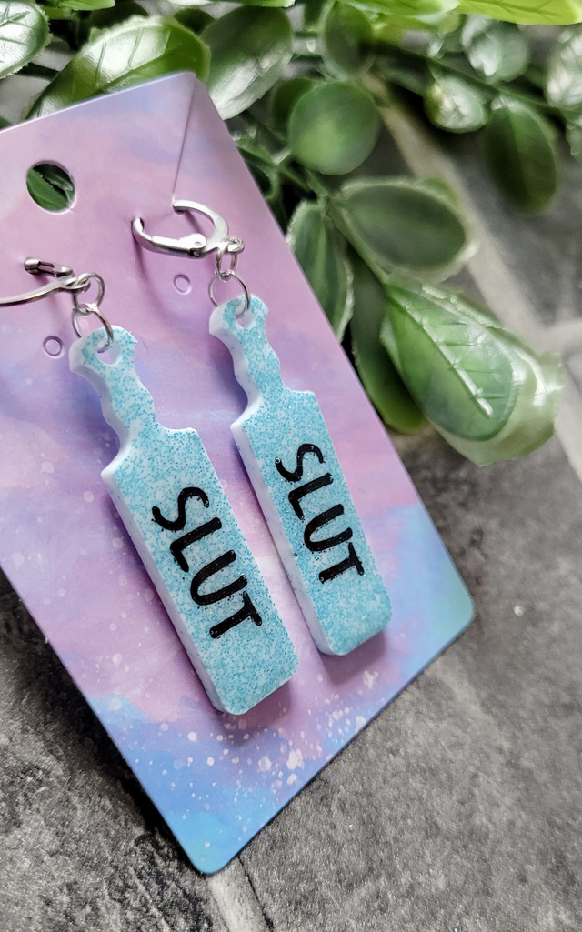 Earrings | SLUT Paddle Earrings Light Blue Glitter on White Base | Stainless Steel Hoops