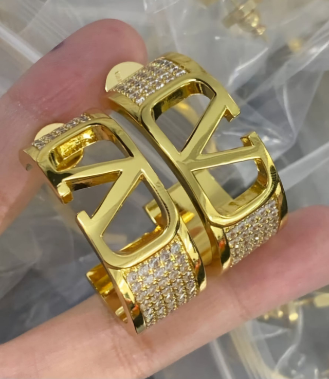 Boucles d'oreilles V doré avec strass