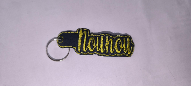 Porte clef nounou jaune 