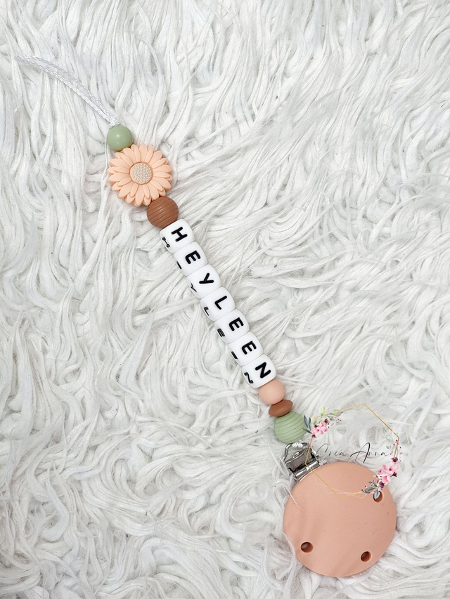 Attache-tétine fleur