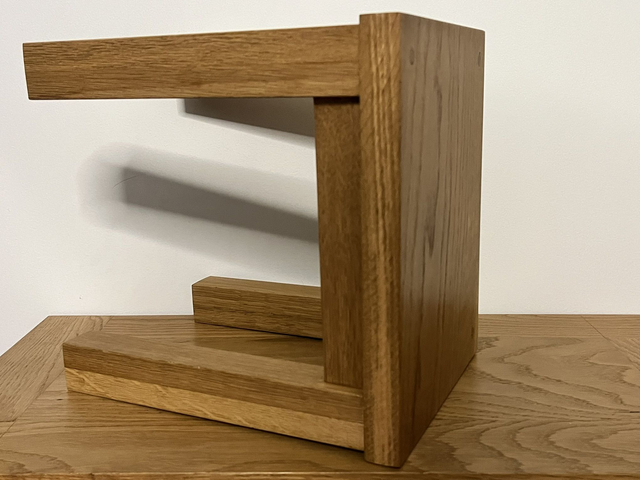 Two rustic low stools made of American Oak.