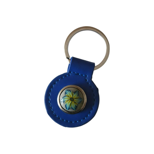 Porte-clés simili cuir bleu fleur bleue