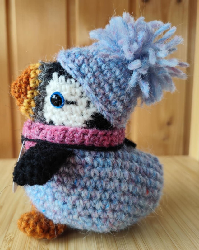 Blues the puffin wearing milky way blue sweater, scarve and hat (made from Icelandic wool yarn)
