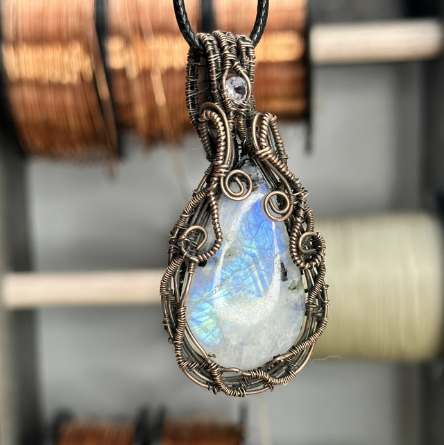 Rainbow moonstone wrapped in pure copper pendant 