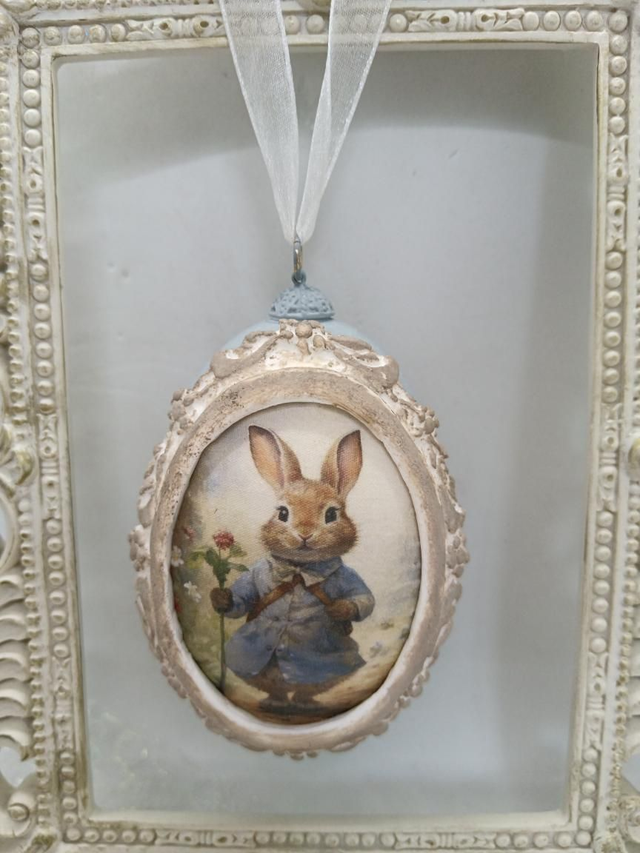 Peter rabbit on a blue hanging Goose eggs 