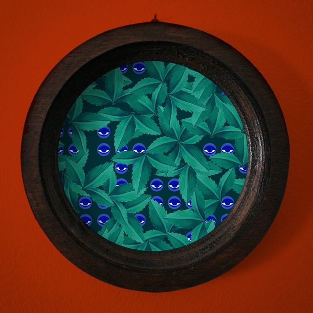 Cadre "Feuillage et yeux bleus"