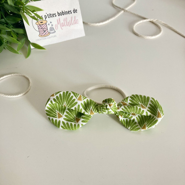 Nœud élastique | Écailles vertes