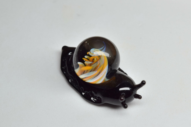 ESCARGOT NOIR IMPLOSION ORANGE