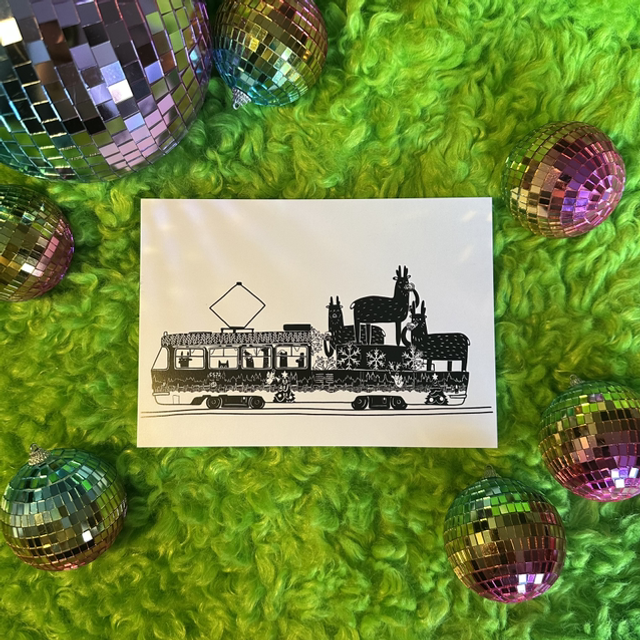 Christmas tram. Deers drink beers