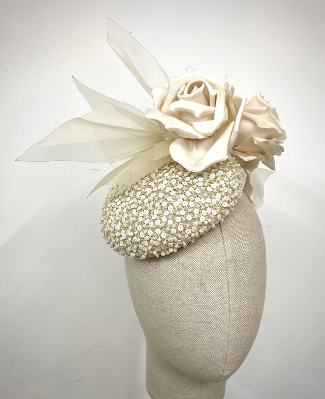 Cream sequin baby beret trimmed satin roses and crinoline