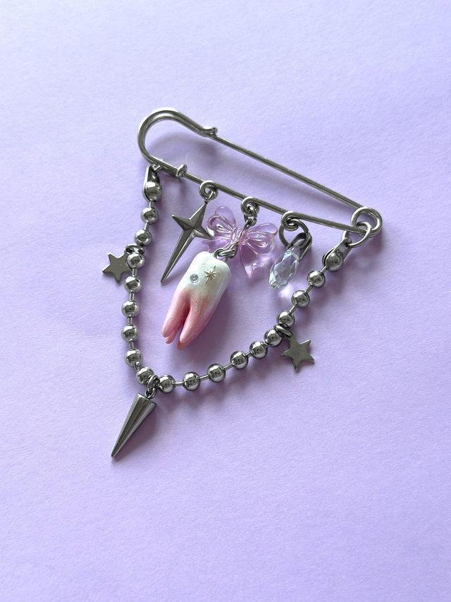 TWINKLY TOOTH