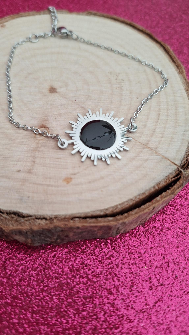 Bracelet argenté soleil noir 