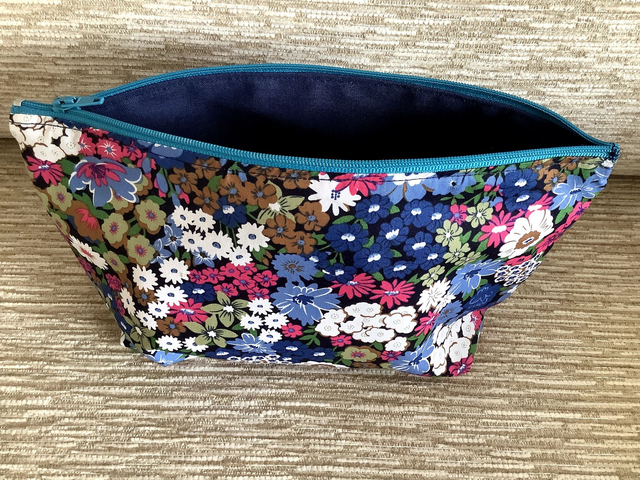 Box Cosmetic Wash Bag with Zip Closure and waterproof lining.