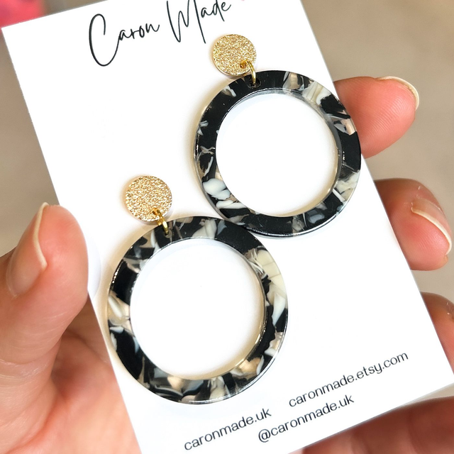 Black, beige and gold acrylic circle earrings