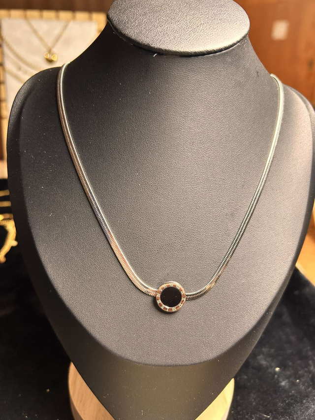 Silver round black