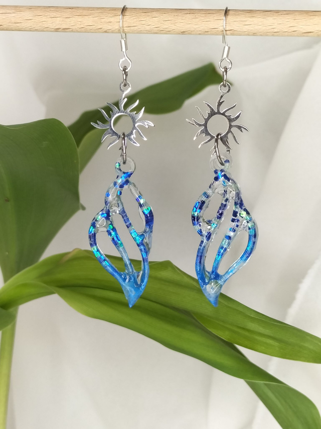 Boucles torsadées bleues pailletées