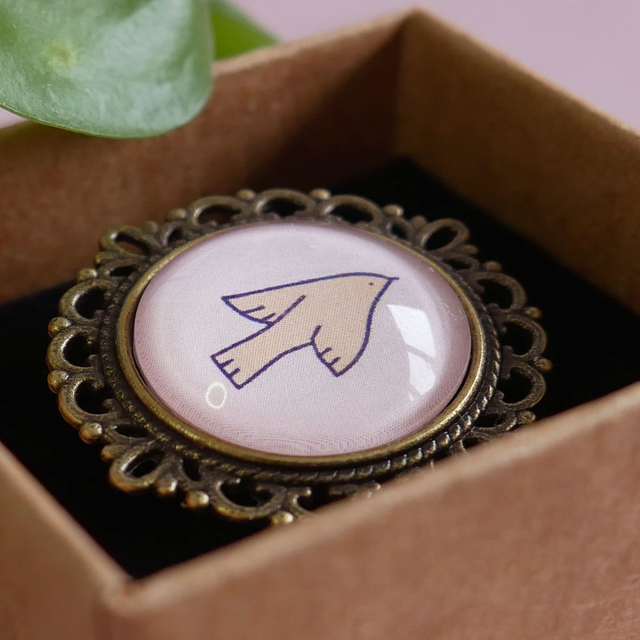 Broche ronde - Oiseau orange