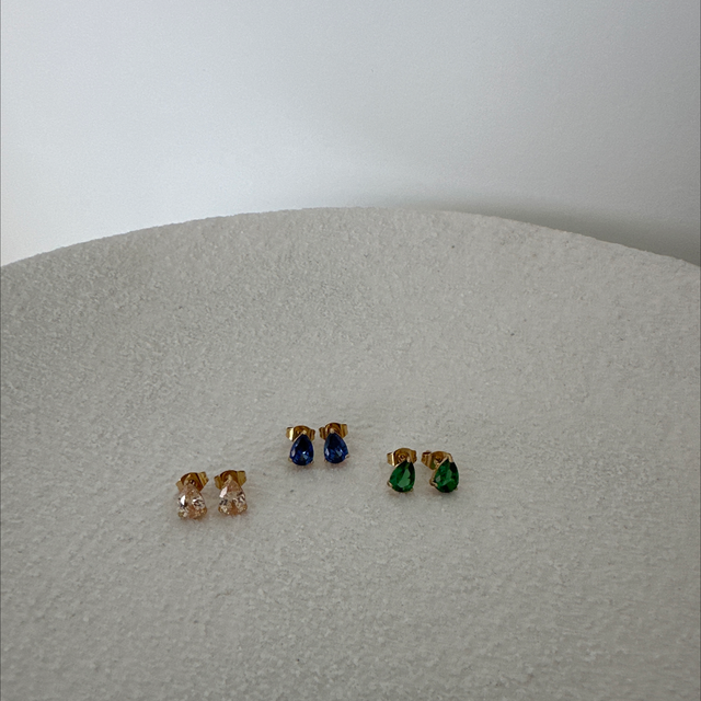 BOUCLES D’OREILLES HISTÓRIA