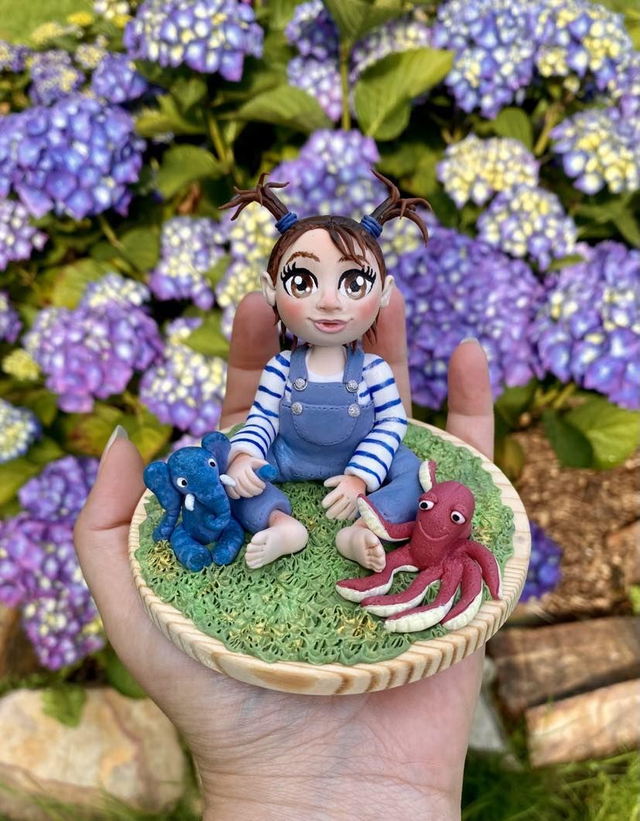 Mon enfant avec ses doudous