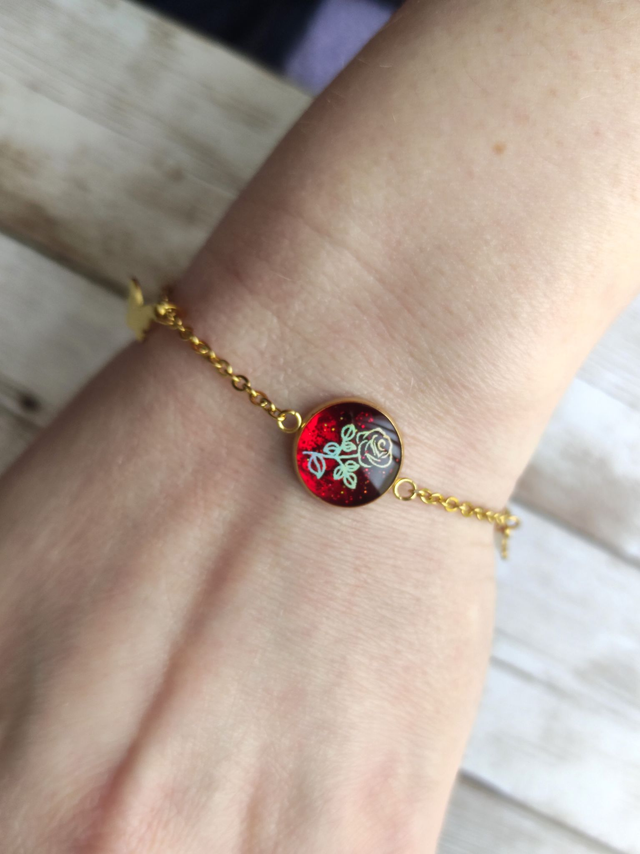 Bracelet acier inoxydable &quot;Butterfly&quot; rouge et sa rose