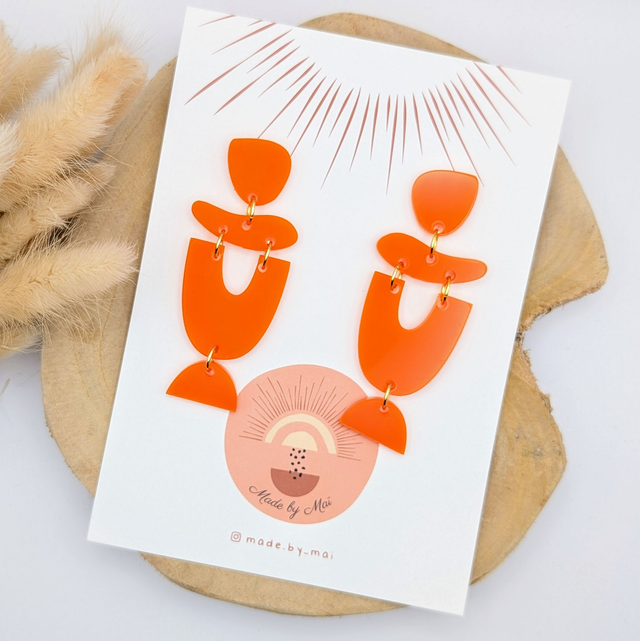 Boucles d&#039;oreilles oranges en plexi