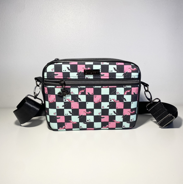 Black and pastel check/bats crossbody bag