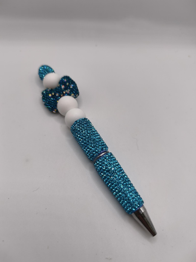 Stylo noeud strass turquoise 